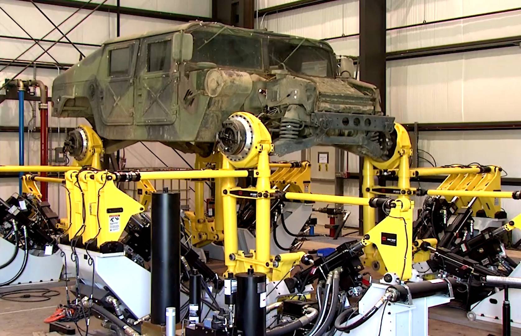 Spindle-Coupled Road Simulator